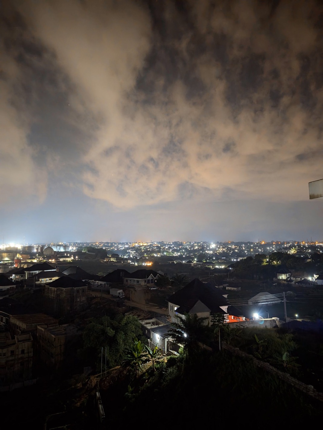 Photo by Night view from portview hotel rooftop